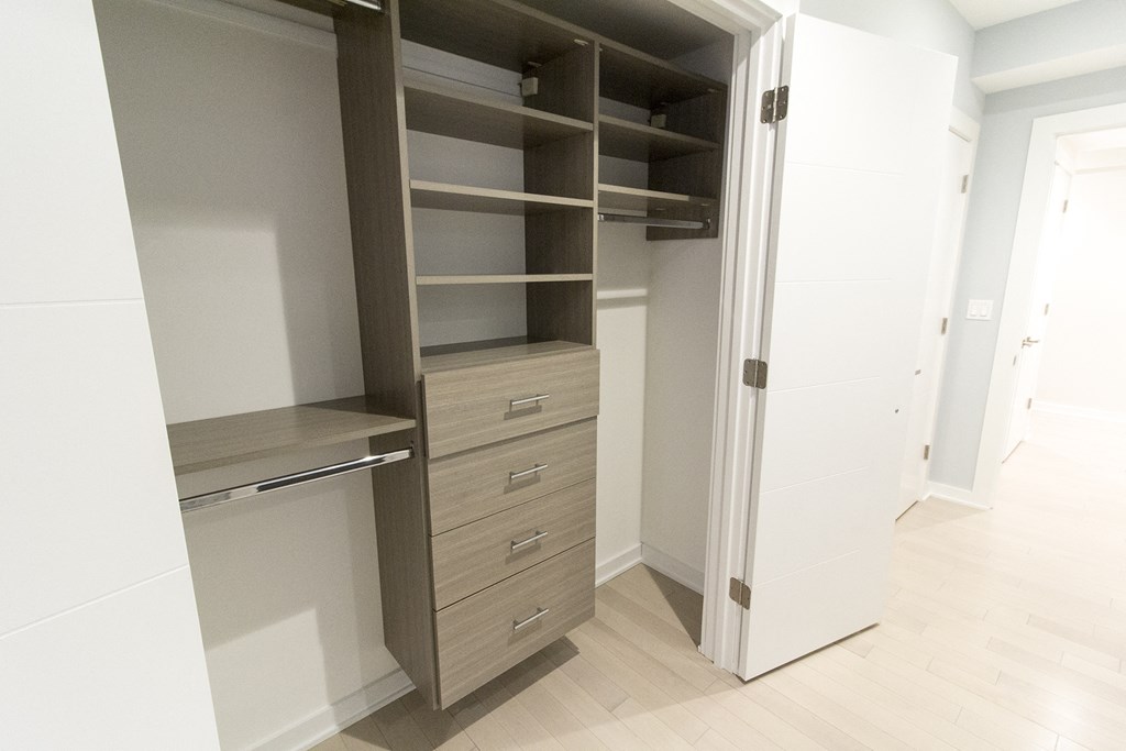 a walk in closet in a new home