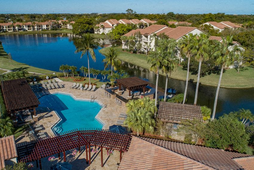 an aerial view of the resort with a large swimming pool