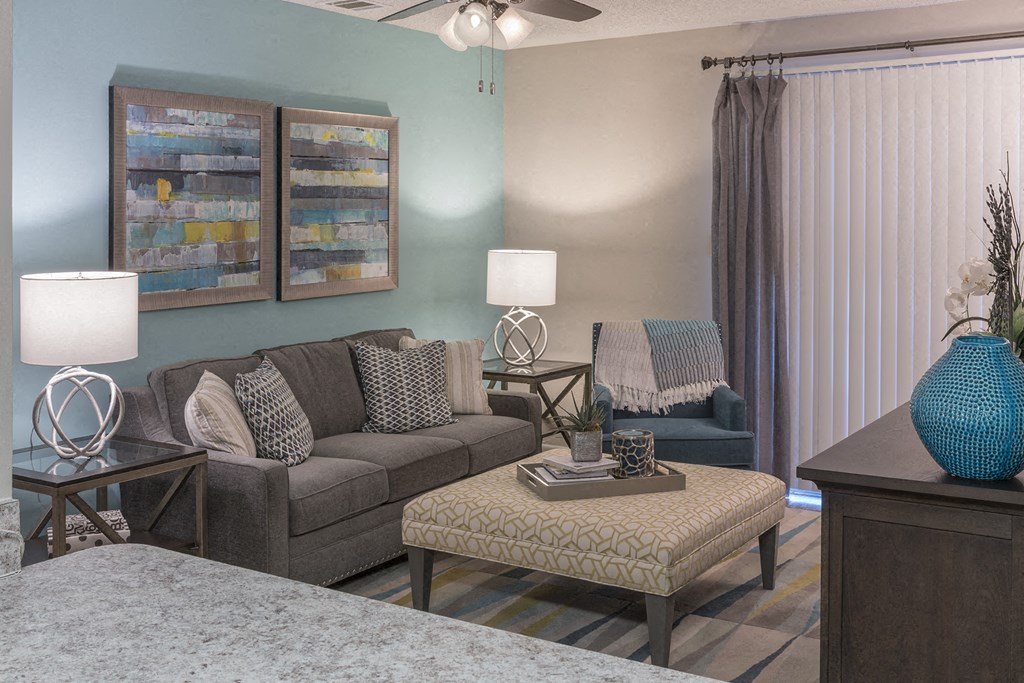 a living room with a couch and a table