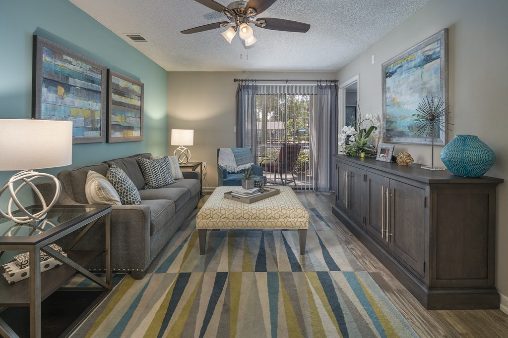 a living room with a couch and a table