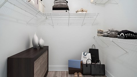 a white room with a shelf with shoes and bags