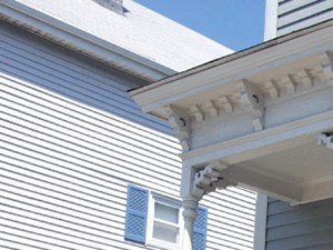 Easterly Shores Apartments the front porch of a house with stairs and a stone wall