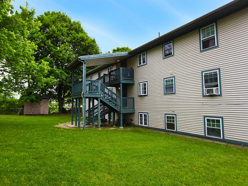 a balcony on the side of a house