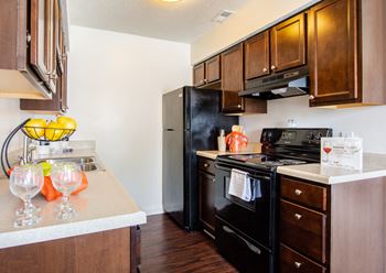 Kitchen with Black Appliances at Hamilton Square Apartments, Westfield, IN
