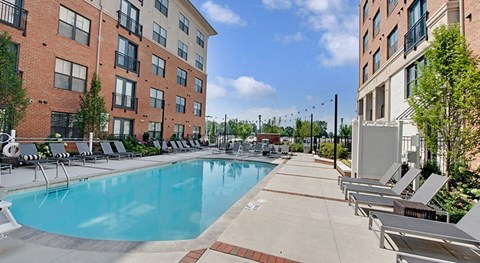 our apartments have a large pool and lounge chairs