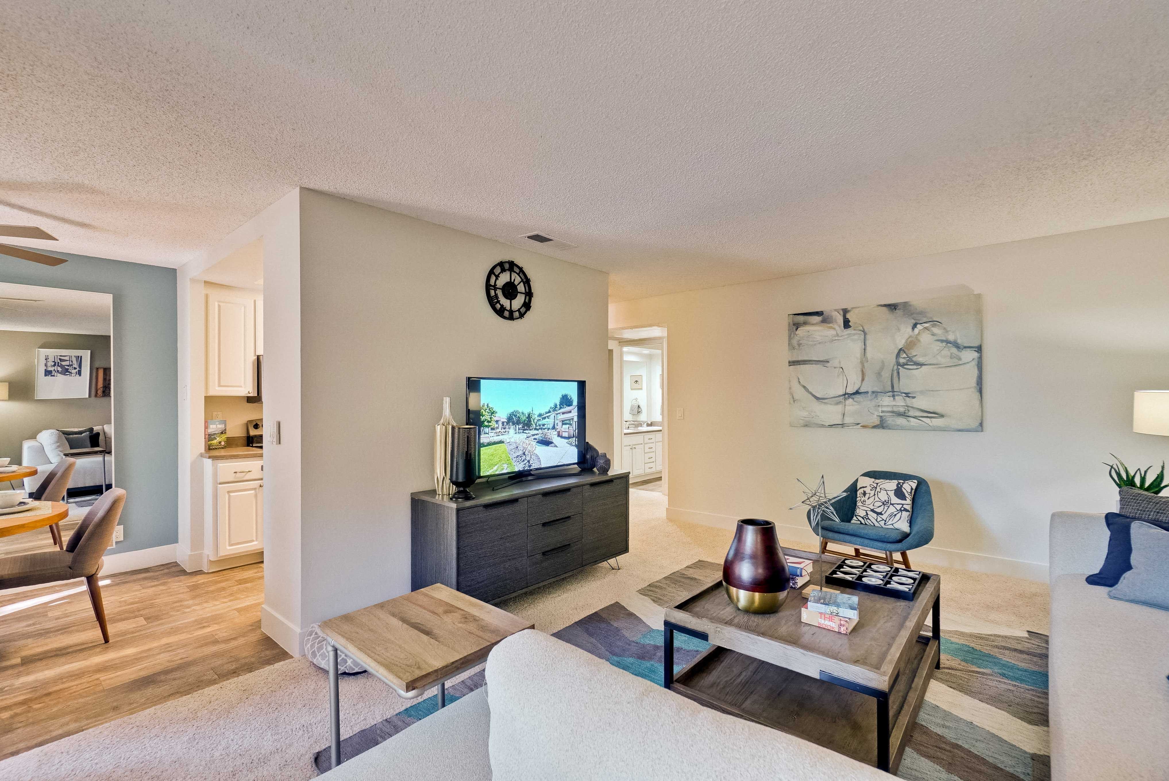 San Jose Apartments for Rent - Villas Willow Glen- Living Room Area with Tan Couch, Wooden Coffee Table, and Television