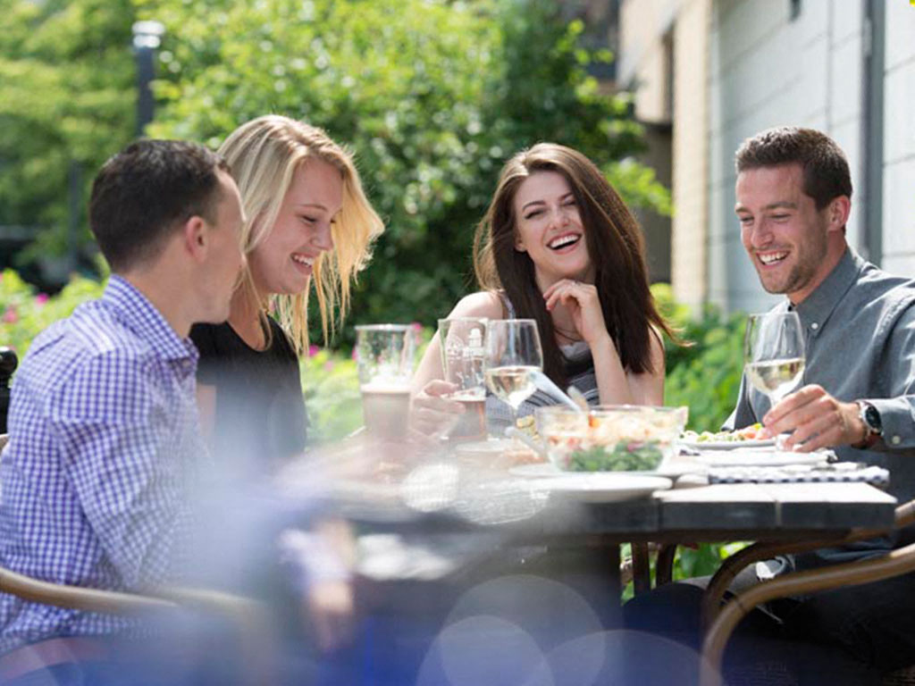 a group of people sitting at a table