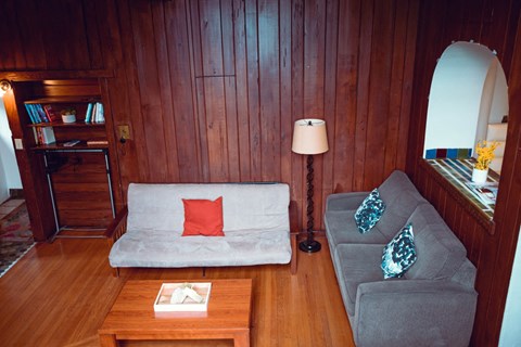 a living room with a couch and a table