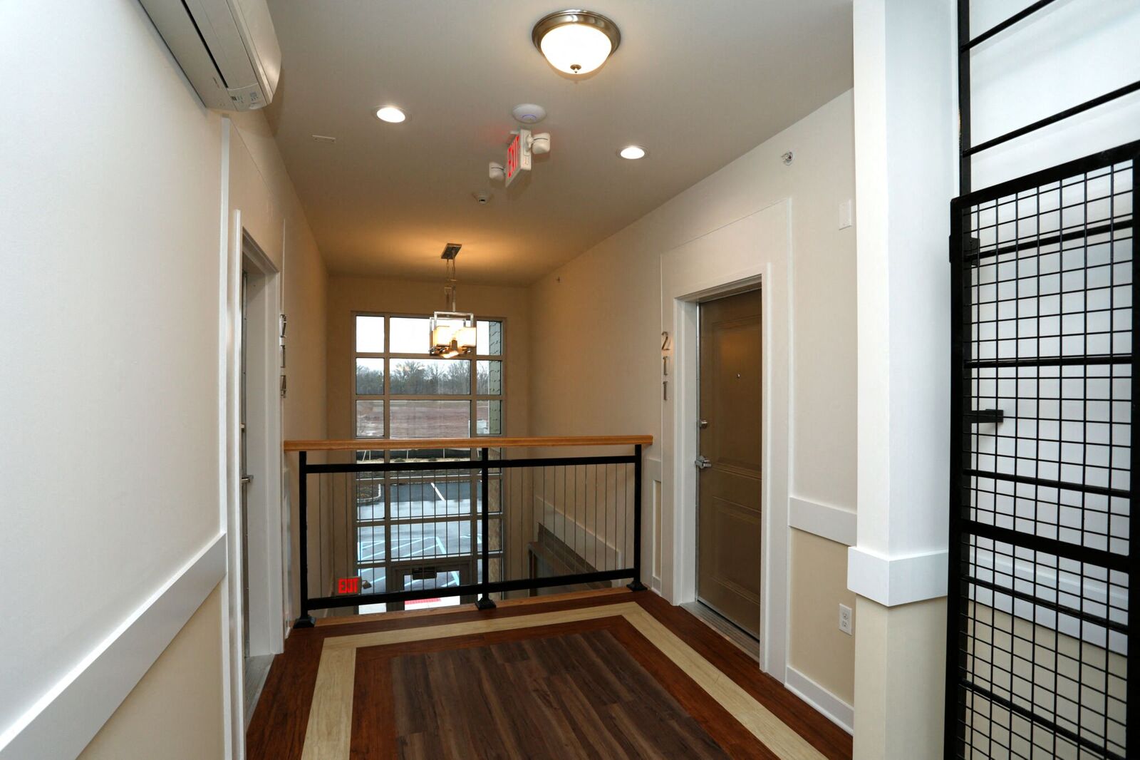 view of the entrances to apartments on second floor