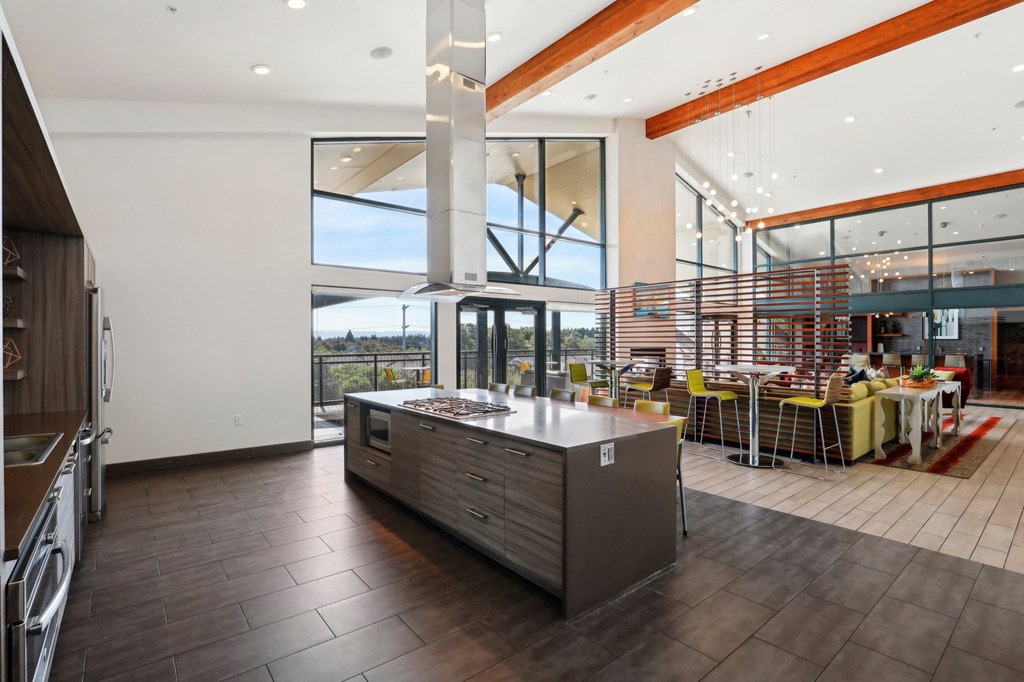 a large kitchen with a large island in the middle of it