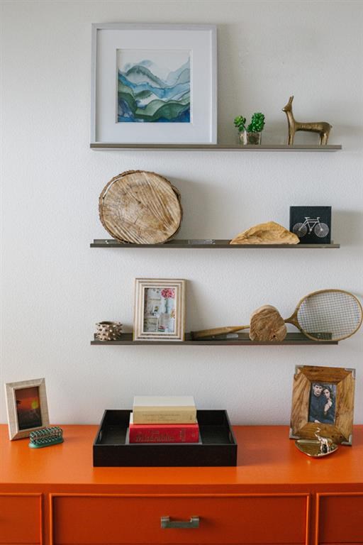 a shelf with a book and other items on it