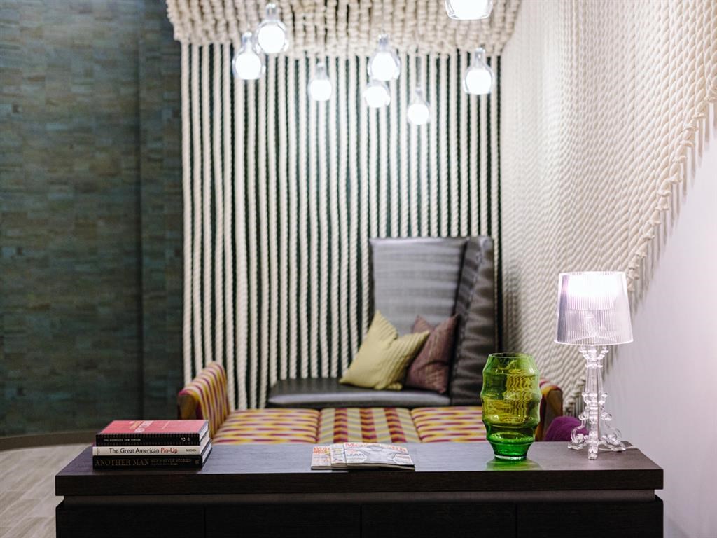 a small living room with a couch and a table