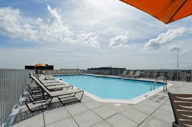 a large swimming pool on top of a building