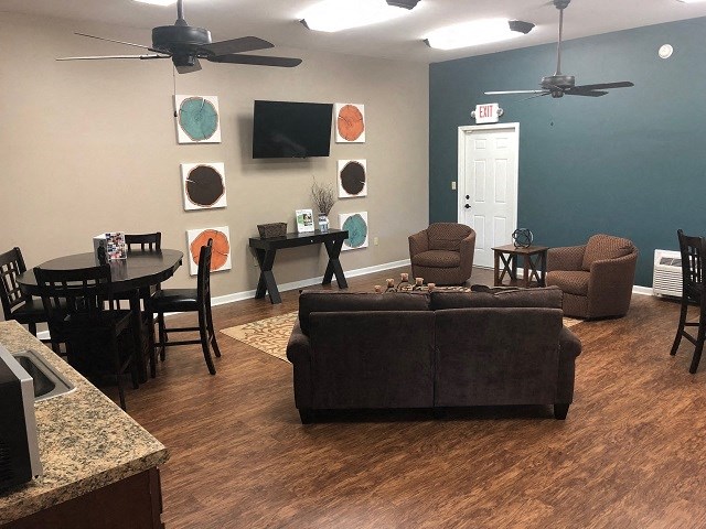 a living room with a couch and a table