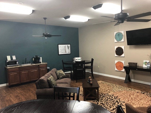 a living room with a couch and a table