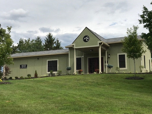 a building with a lawn in front of it