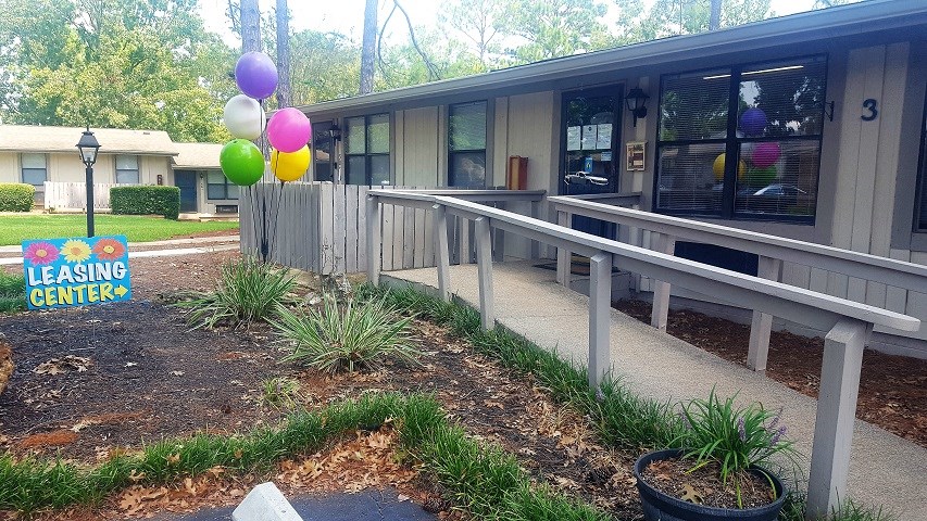a building with balloons on the side of it