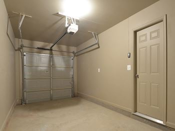 a bedroom with a closet and a door at The Pointe at Manorgreen Townhomes, Baltimore, 21220