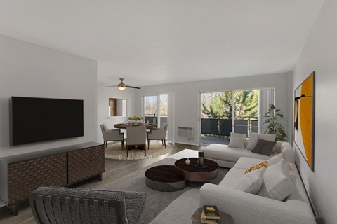 a living room with a couch and a table and a tv