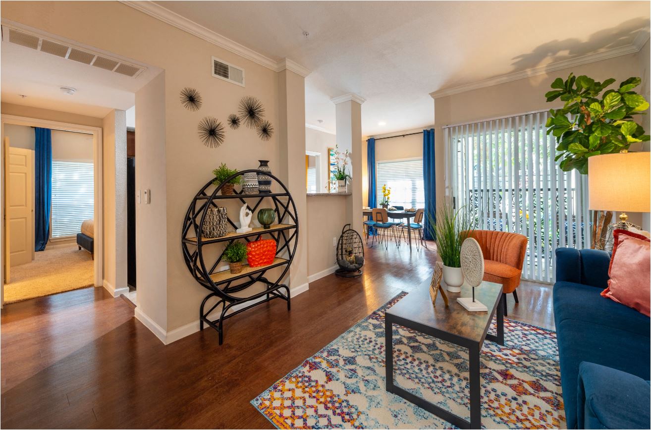 a living room with a couch and a table