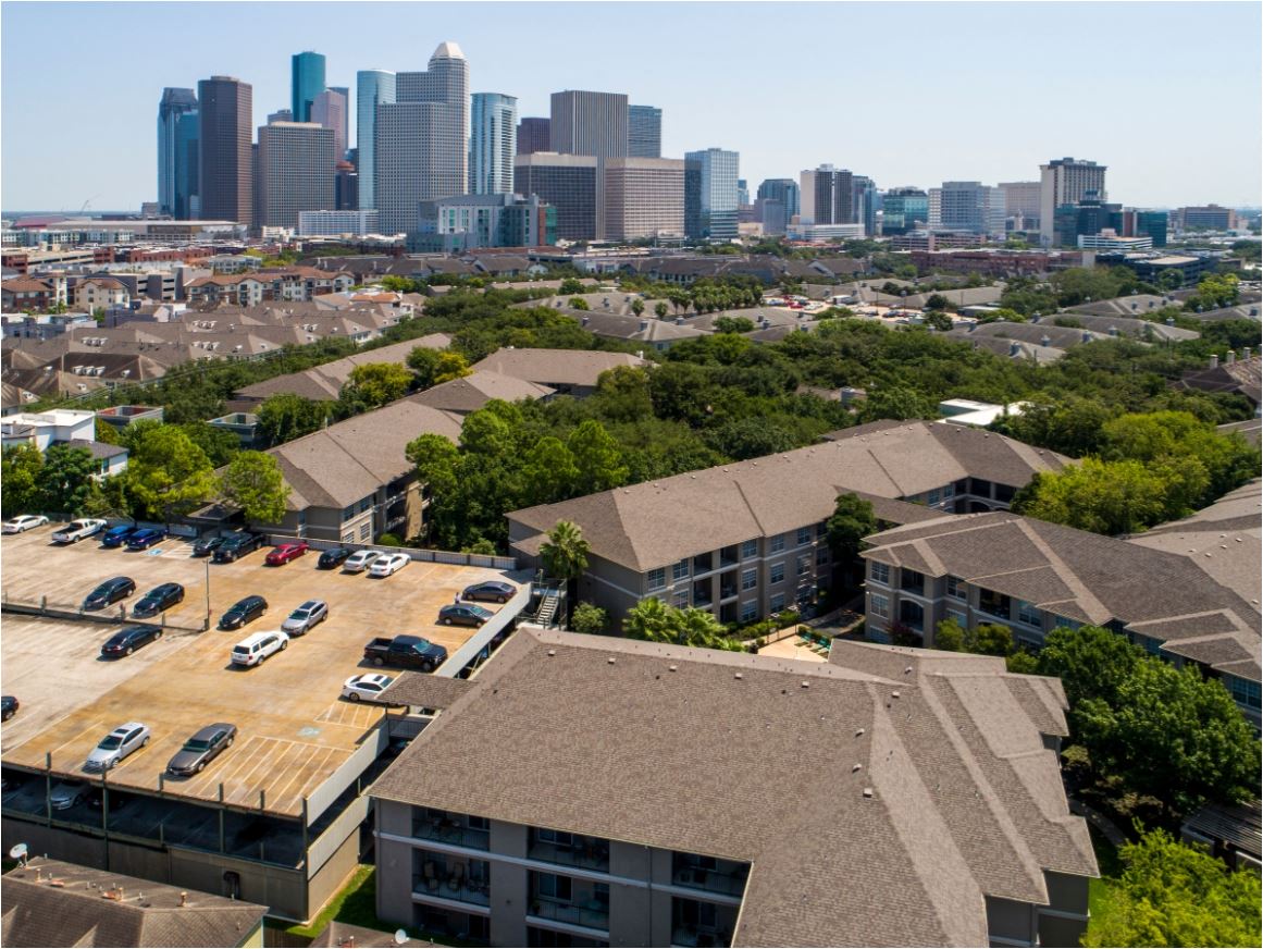 a view of the city from a roof top of a building