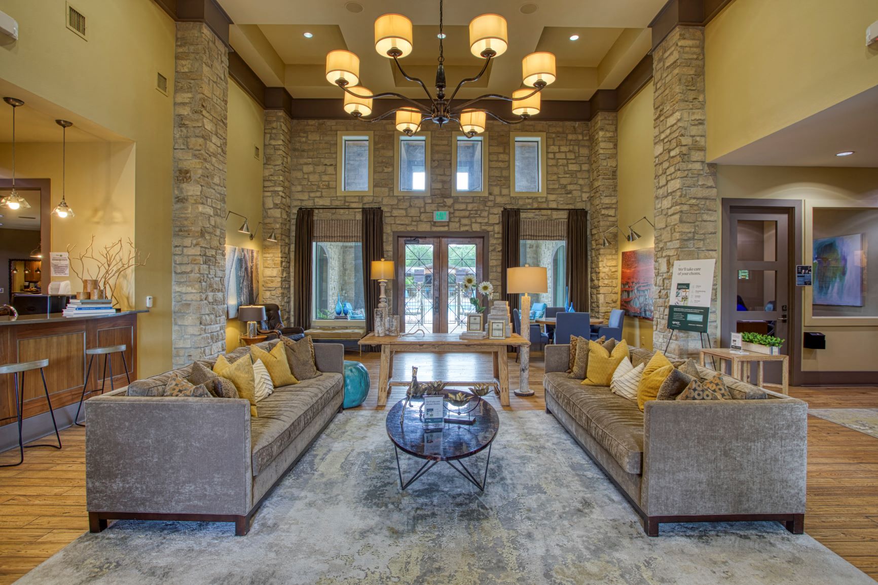 a large living room with couches and a coffee table
