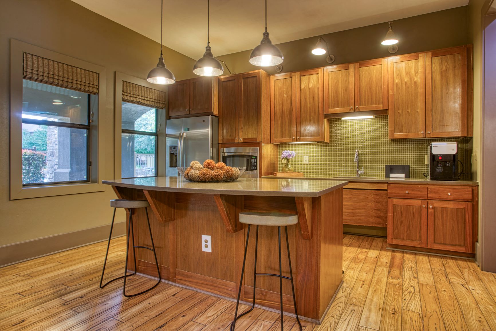 a kitchen with wooden cabinets and a counter top