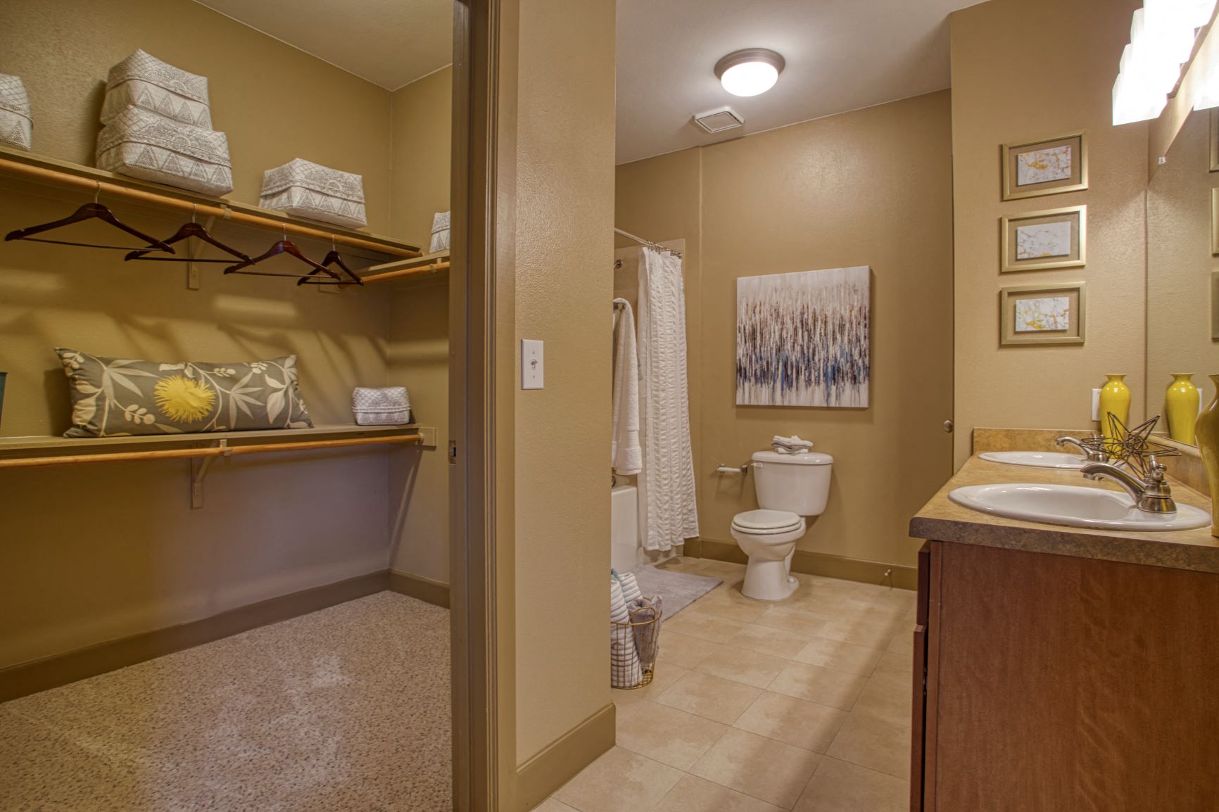 a bathroom with a toilet and a sink and a mirror