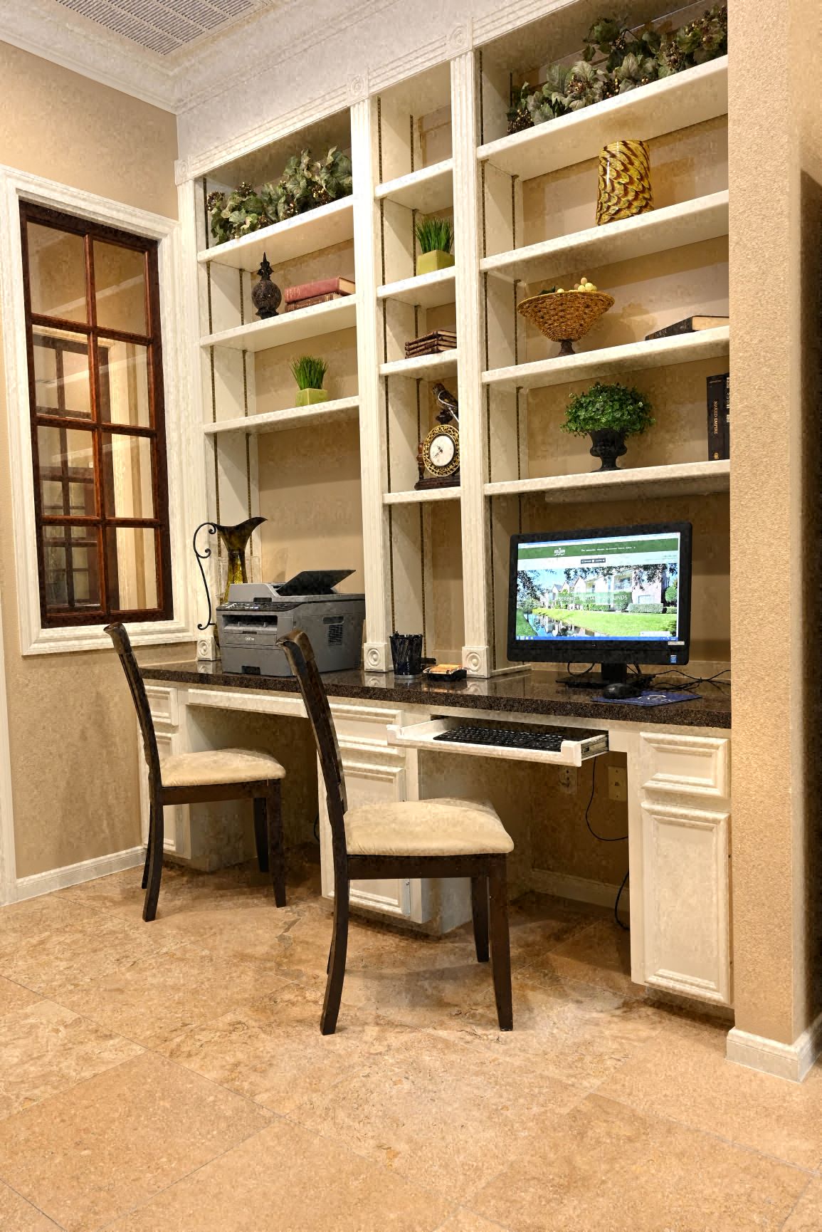 a home office with a desk and a computer