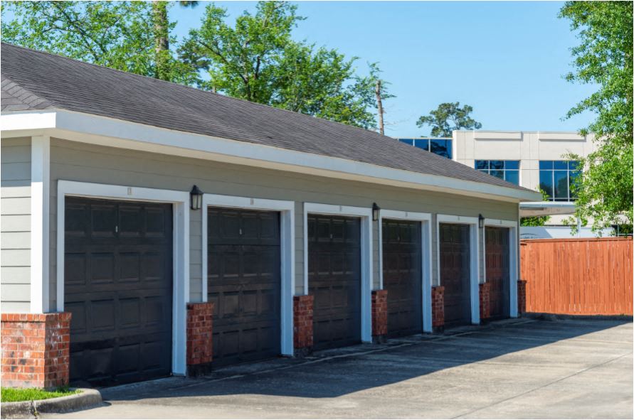 a row of garage doors on a building