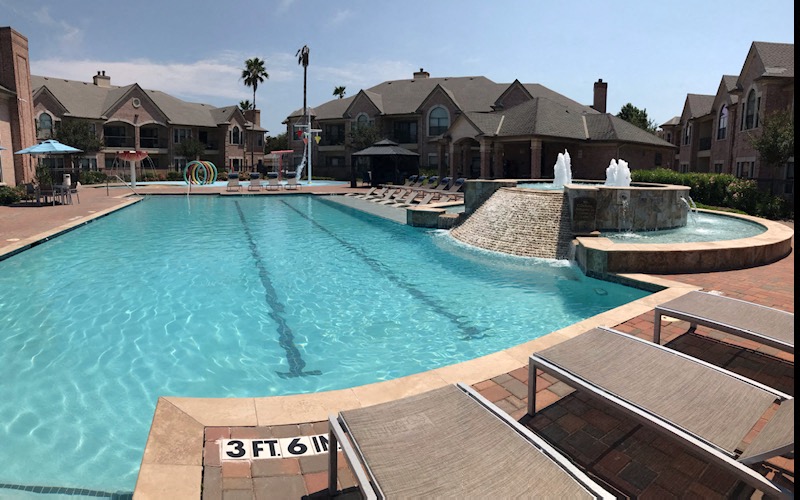 San Brisas Apartments Pool Area with fountain