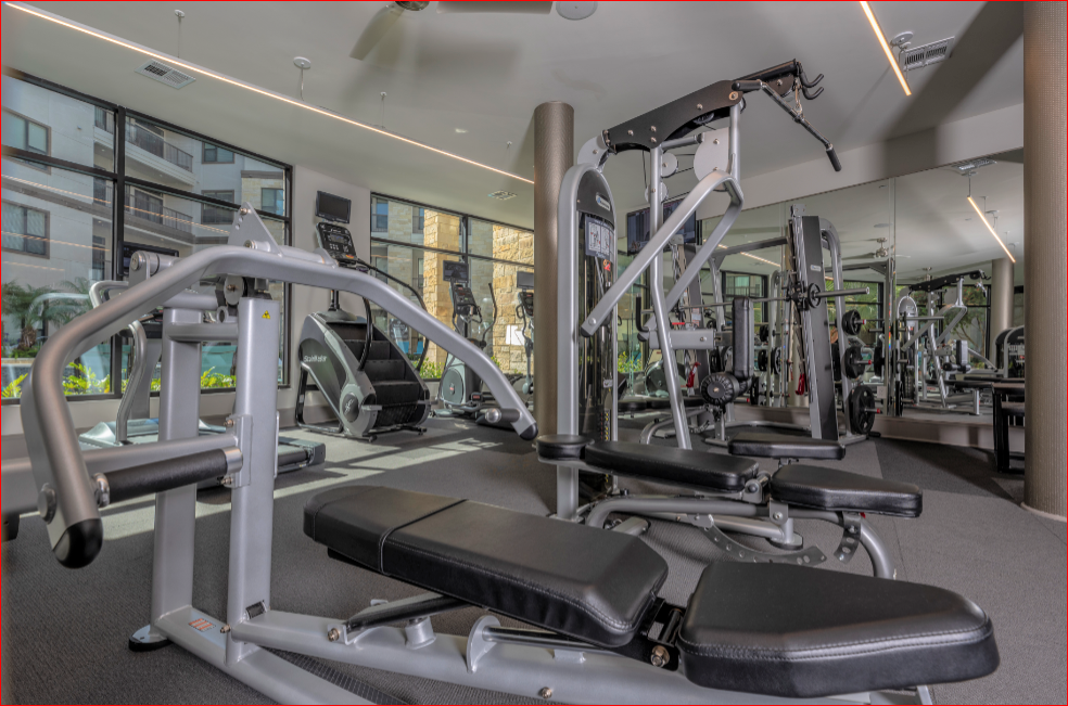 a gym with weights and cardio equipment at the renaissance atlanta airport hotel
