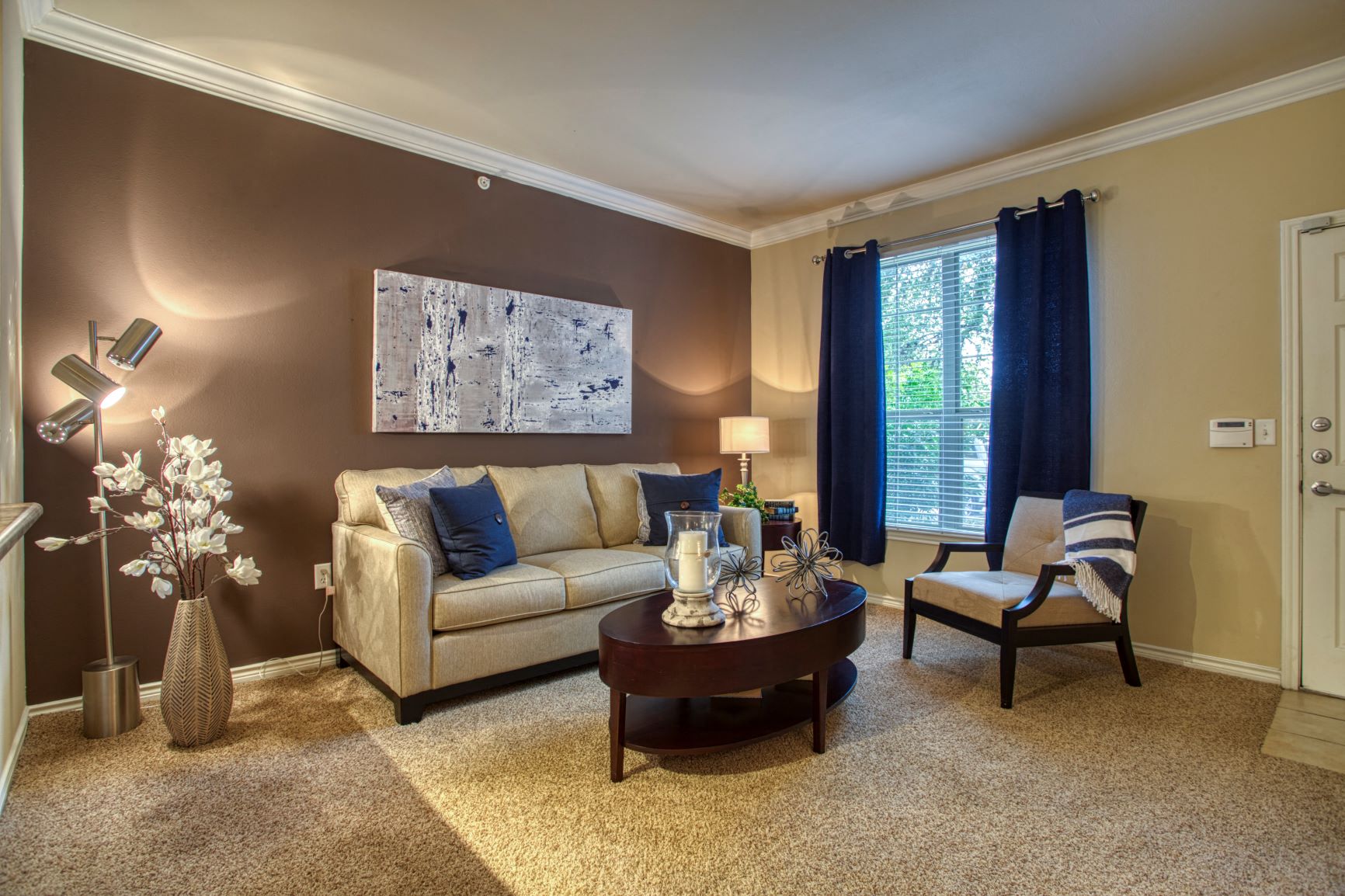 a living room with a couch and a table