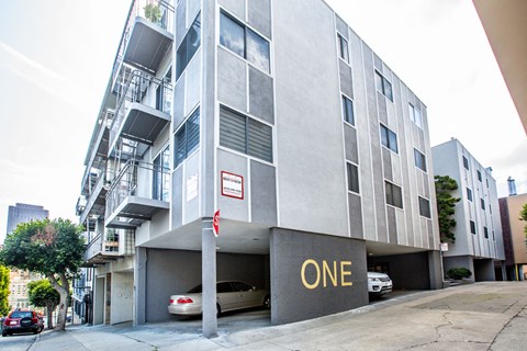 A modern building with the word ONE on the front.