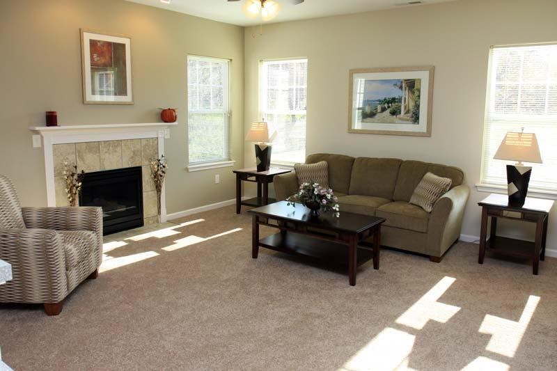 a living room with a couch and a table