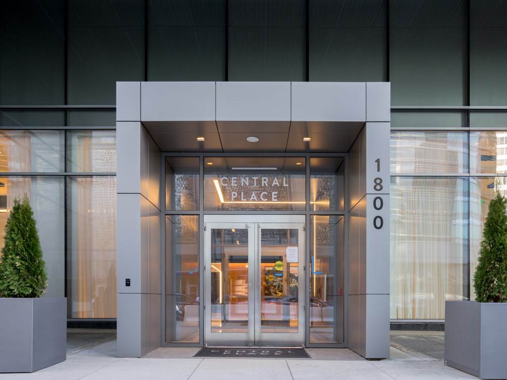the entrance to a building with a revolving door
