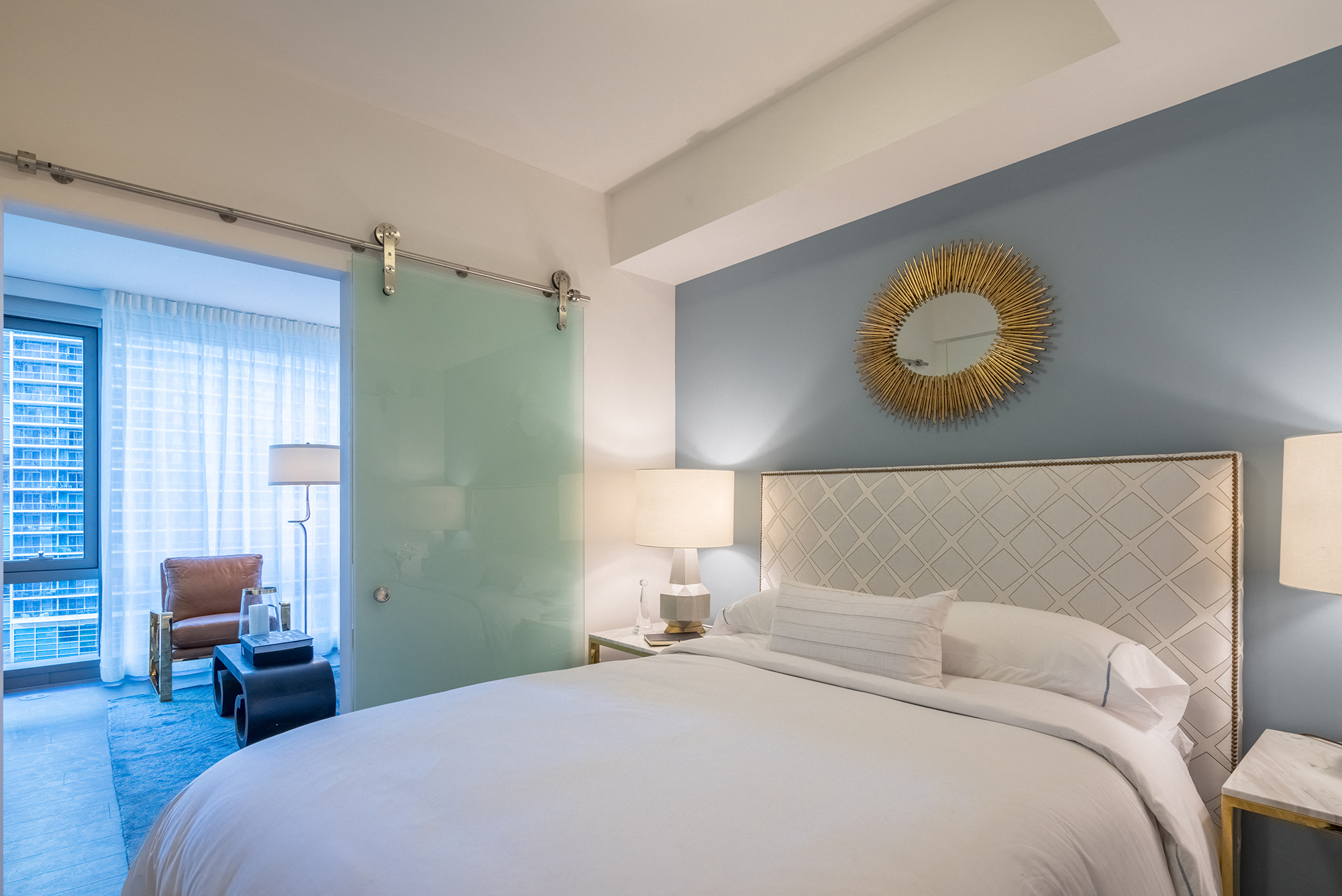 Bedrooms with Wide Plank Flooring and Barn Doors