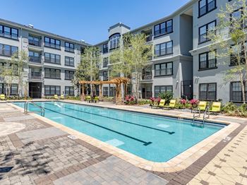 Large Lap Pool With Sundeck at The Bartram Apartments in Gainesville, FL