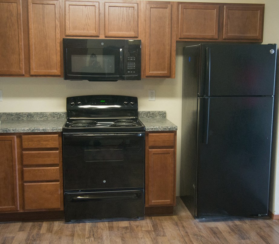 Image of stove, microwave, and refrigerator