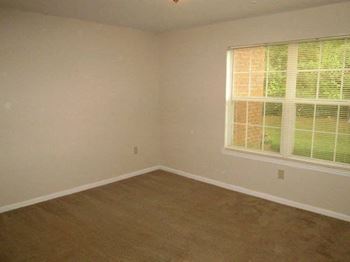 plush tan carpeting in bedrooms