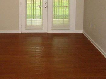 hardwood-style laminate flooring in living room