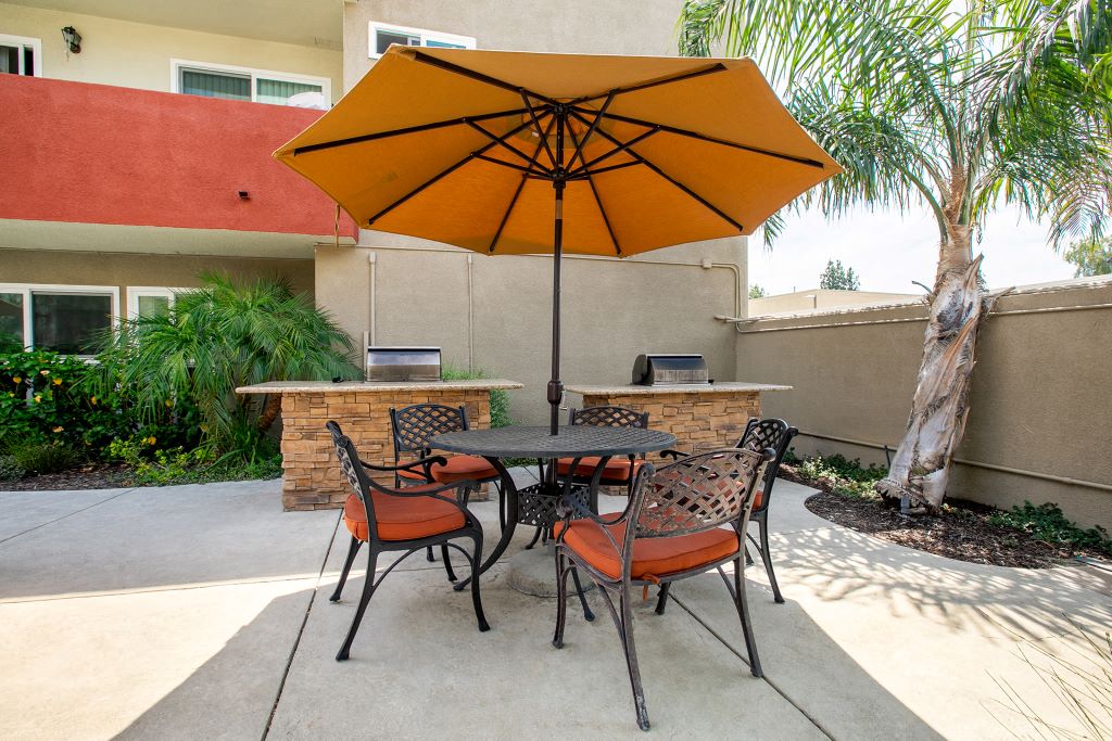Apartments for Rent in Woodland Hills CA - Lombardi - Two Community Grills and a Shaded Seating Area