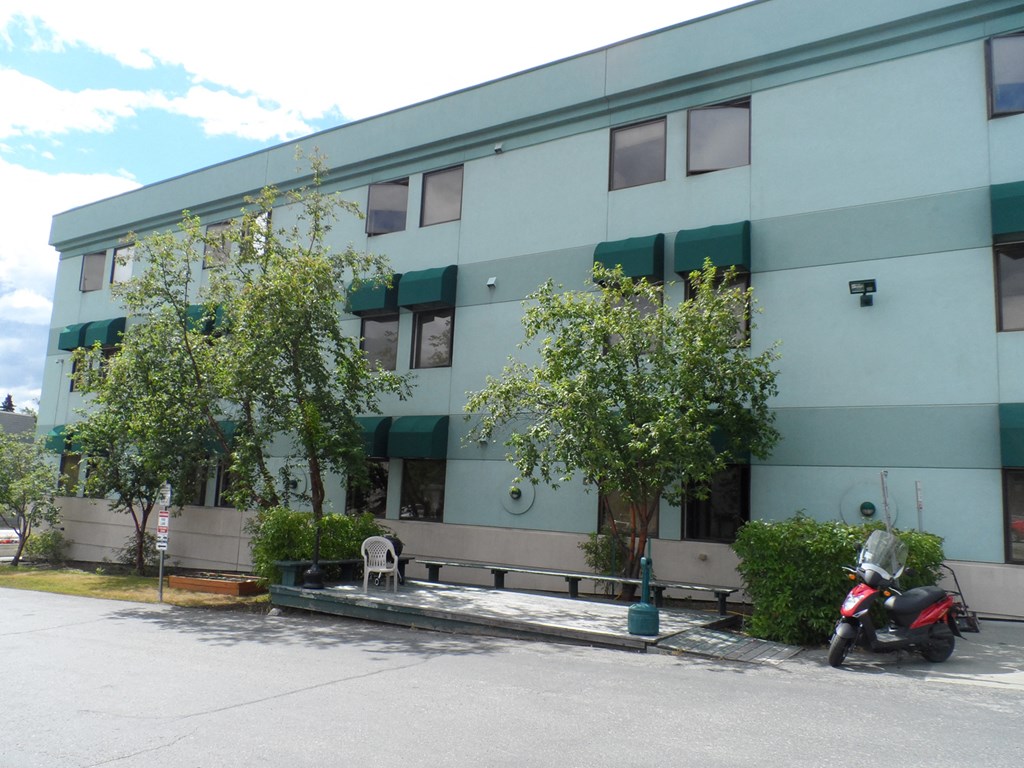 a building with a scooter parked in front of it