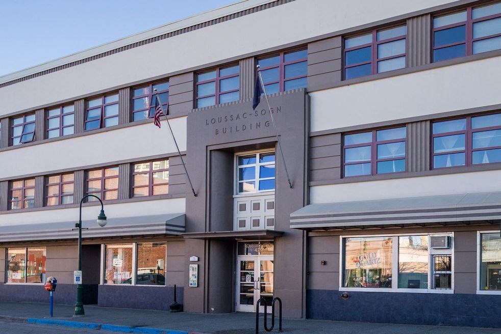 a large building with a sign on the front of it