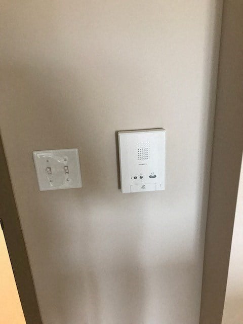 a door with two electrical outlets on it
