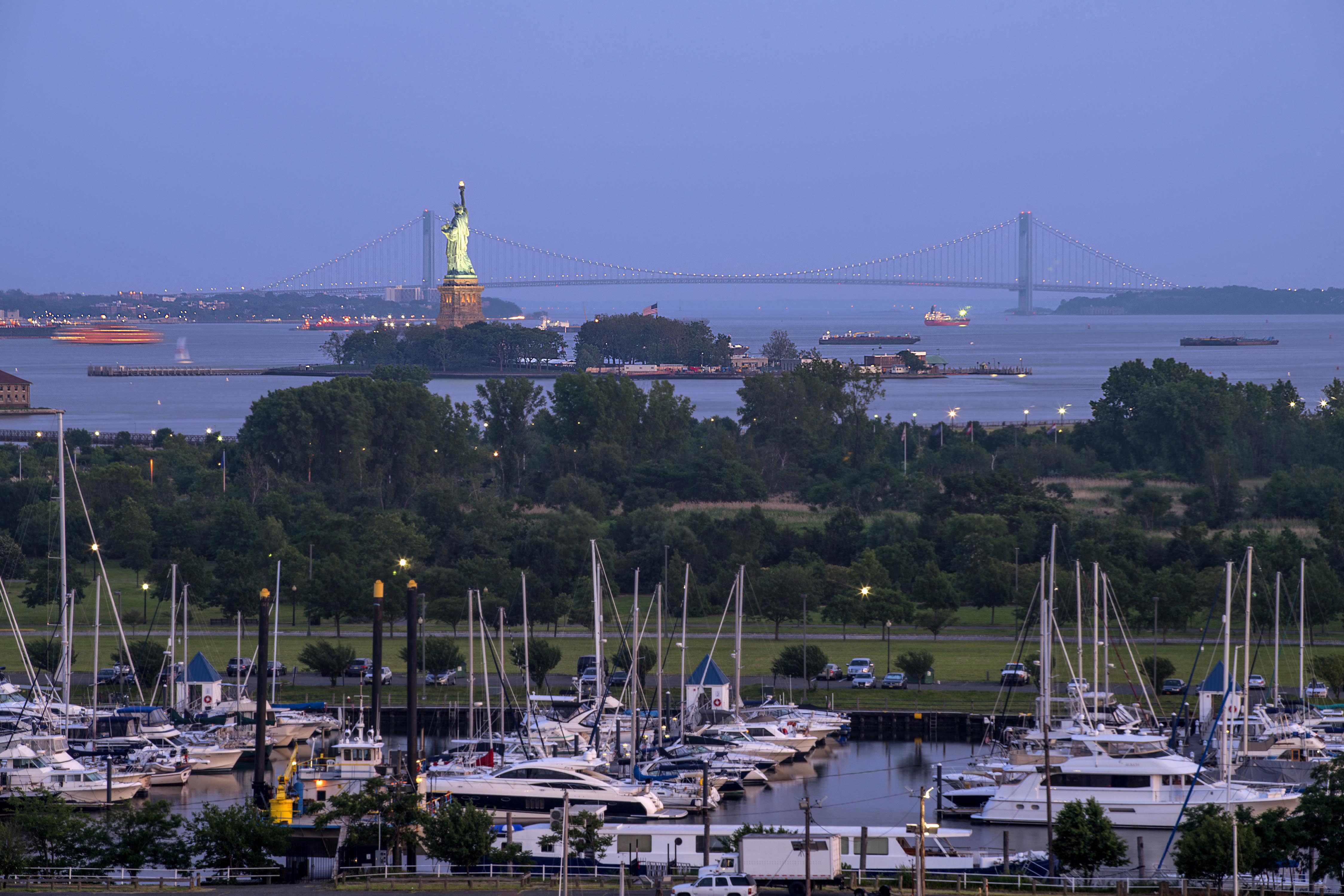 a view of the harbor with the golden gate bridge in the background