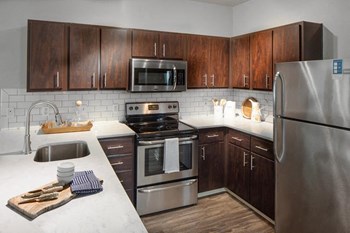 Fully-Equipped Kitchen at Kearney Plaza Apartments in Portland, Oregon