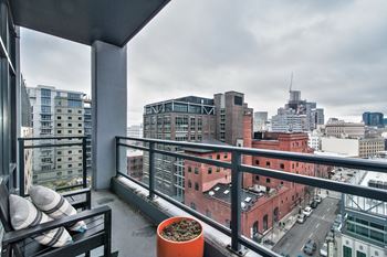 Refreshing Balcony Space With Views at The Louisa Apartments in Portland, Oregon