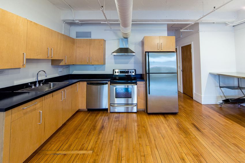 Fully Furnished Kitchen With Stainless Steel Appliances Fully Furnished Kitchen With Stainless Steel Appliances at 1525 Broadway, Detroit, MI, 48226 - Photo Gallery