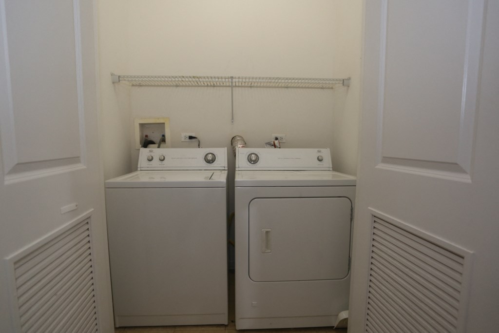 a washer and dryer in the laundry room of a home